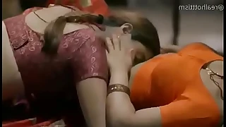 Hot women in saree giving a kiss