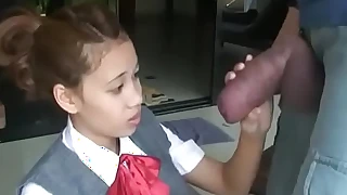 Oriental schoolgirl opens near less suck giving cock