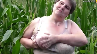 Big big mommy conclude this in a cornfield