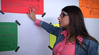 Mia khalifa shows her friend how to suck locate